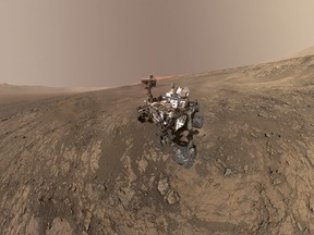 In a NASA photo, the Curiosity rover near the edge of the Gale Crater on Mars, Feb. 4, 2018.