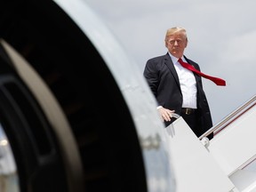President Donald Trump boards Air Force One, Thursday, July 5, 2018, at Andrews Air Force Base, Md., en route to a rally in Great Falls, Mont.