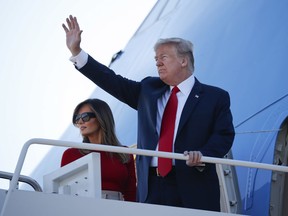 President Donald Trump and first lady Melania Trump board Air Force One, Tuesday, July 10, 2018, at Andrew Air Force Base, Md. Trump is traveling on a weeklong trip to Europe on a four-nation tour, with stops in Belgium, England, Scotland and Finland.