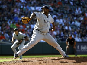 New York Yankees starting pitcher CC Sabathia throws to the Baltimore Orioles in the third inning of the first baseball game of a doubleheader, Monday, July 9, 2018, in Baltimore.