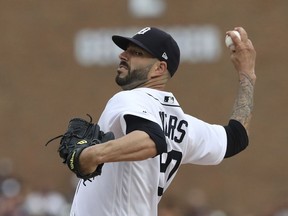 Detroit Tigers starting pitcher Mike Fiers throws during the first inning of the team's baseball game against the Boston Red Sox, Saturday, July 21, 2018, in Detroit.