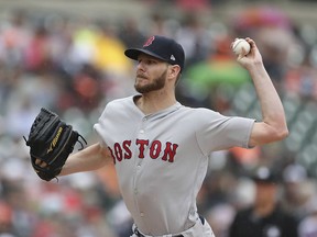 Boston Red Sox starting pitcher Chris Sale throws during the first inning of a baseball game against the Detroit Tigers, Sunday, July 22, 2018, in Detroit.