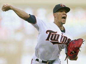 Minnesota Twins pitcher Jose Berrios throws against the Kansas City Royals in the first inning of a baseball game Monday, July 9, 2018, in Minneapolis.