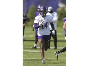 Minnesota Vikings wide receiver Stefon Diggs carries the ball during NFL football practice in Eagan, Minn., Saturday, July 28, 2018.