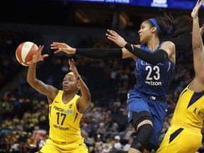 Minnesota Lynx Maya Moore passes the  ball to a teammate during a WNBA basketball game against the Indiana Fever, Wednesday, July 18, 2018 in Minneapolis.