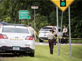 Police work the scene of an officer involved shooting in Chanhassen, Minn., on Friday, July 13, 2018.