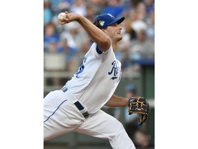 Kansas City Royals starting pitcher Burch Smith throws during the first inning against the Detroit Tigers in a baseball game Tuesday, July 24, 2018, in Kansas City, Mo.