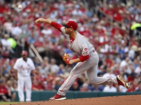 Cincinnati Reds starting pitcher Matt Harvey throws during the first inning of the team's baseball game against the St. Louis Cardinals on Friday, July 13, 2018, in St. Louis.