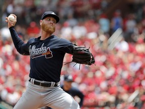 Atlanta Braves starting pitcher Mike Foltynewicz throws during the second inning of a baseball game against the St. Louis Cardinals, Sunday, July 1, 2018, in St. Louis.