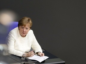 German Chancellor Angela Merkel attends a budget debate at the German parliament, Bundestag, at the Reichstag building in Berlin, Tuesday, Germany, July 3, 2018.