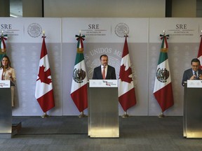 Mexico's Foreign Minister Luis Videgaray, center, Canadian Foreign Affairs Minister Chrystia Freeland, left, and Mexico's Economy Secretary Ildefonso Guajardo, give a joint news conference about ongoing negotiations concerning the North American Free Trade Agreement (NAFTA) in Mexico City, Wednesday, July 25, 2018.