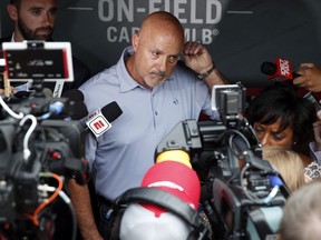 Washington Nationals general manager Mike Rizzo pauses while speaking during a media availability before a baseball game against the New York Mets at Nationals Park, Tuesday, July 31, 2018, in Washington.