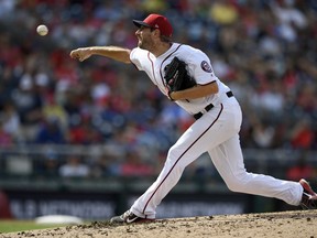 Washington Nationals starting pitcher Max Scherzer delivers during the fourth inning of a baseball game against the Atlanta Braves, Sunday, July 22, 2018, in Washington.