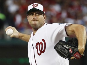 Washington Nationals pitcher Max Scherzer (31) throws during first inning of the Major League Baseball All-star Game, Tuesday, July 17, 2018 in Washington.