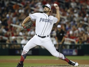 San Diego Padres pitcher Brad Hand (52) throws in the eighth inning during the Major League Baseball All-star Game, Tuesday, July 17, 2018 in Washington.