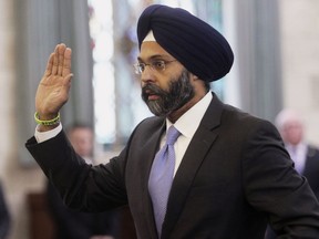 FILE - In this Jan. 16, 2018, file photo, Gurbir Grewal is sworn in before testifying in front of the senate judiciary committee in Trenton, N.J. WKXW-FM radio hosts Dennis Malloy and Judi Franco are receiving heavy criticism for repeatedly referring to Grewal, the state's attorney general, as "turban man" on air, Wednesday, July 25, The Record reports.