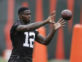 FILE - In this June 5, 2018, file photo, Cleveland Browns wide receiver Josh Gordon warms up during the team's organized team activity at its NFL football training facility, in Berea, Ohio. Grordon, who has been suspended numerous times by the NFL for drug violations, announced on Twitter that he will not be with the team when camp opens later this week. Gordon says his absence "is a part of my overall health and treatment plan."