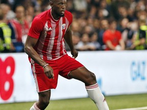 FILE - In this Tuesday, June 12, 2018, file photo, former Olympic and Jamaican sprinter Usain Bolt controls the ball during a charity soccer match between members of the 1998 World Cup winning French team and a team of international veteran players who were also involved in the same tournament, at the U Arena in Nanterre, north of Paris, France. Bolt is making a run at professional soccer in Australia. Now, at 31, he will try out for six weeks with the Central Coast Mariners starting next month. If all goes well, he could play for a season in Australia's A-League.