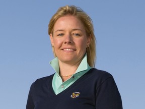This June 20, 2015, photo provided by the USGA shows Sarah Hirshland during the third round of the 2015 U.S. Open golf tournament at Chambers Bay in University Place, Wash. The U.S. Olympic Committee has hired Sarah Hirshland as its CEO, placing the executive at the U.S. Golf Association in charge of stabilizing an organization that has been hammered by sex-abuse scandals spanning several Olympic sports.