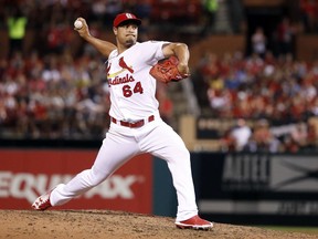 FILE - In this Wednesday, June 27, 2018, file photo, St. Louis Cardinals relief pitcher Sam Tuivailala throws during the seventh inning of a baseball game against the Cleveland Indians in St. Louis. The Seattle Mariners have bolstered their bullpen by Tuivailala from the Cardinals on Friday, July 27, 2018, in exchange for minor-league pitcher Seth Elledge.  Tuivailala is 3-3 with a 3.69 ERA in 31 appearances for St. Louis this season, his second full season in the big leagues.