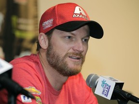 FILE - In this Nov. 17, 2017, file photo, Dale Earnhardt Jr. speaks with the media during a news conference before a NASCAR Cup Series auto race at Homestead-Miami Speedway in Homestead, Fla. NBC Sports is set to bench its play-by-play NASCAR announcer for an all-analyst lineup headlined by Dale Earnhardt Jr. The network will use three analysts in the broadcast booth for next week's NASCAR Cup race at New Hampshire Motor Speedway. Earnhardt, Jeff Burton and Steve Letarte will be the only broadcasters for the July 22 race at the Magic Mile.