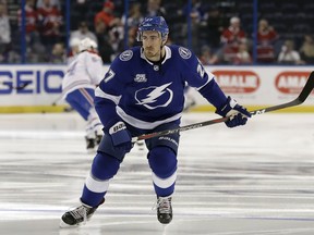 FILE - In this March 10, 2018, file photo, Tampa Bay Lightning defenseman Ryan McDonagh (27) skates in warm-ups prior to an NHL hockey game against the Montreal Canadiens, in Tampa, Fla. The Tampa Bay Lightning have signed defenseman Ryan McDonagh to a $47.25 million, seven-year contract extension. The deal begins with the 2019-20 season. General manager Steve Yzerman announced the contract Sunday, minutes after the Lightning and McDonagh were eligible to ink the extension.
