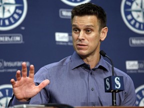 FILE - In this Oct. 3, 2017, file photo, Seattle Mariners general manager Jerry Dipoto speaks with reporters during a baseball news conference in Seattle. The Mariners signed Dipoto to a multiyear contract extension on Friday, July 6, 2018, a reward for the club being on track to end the longest playoff drought in the four major professional sports in the U.S.