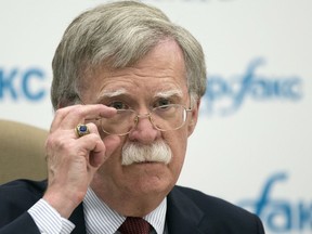 FILE - In this June 27, 2018, file photo, U.S. National security adviser John Bolton listens to question as speaks to the media after his talks with Russian President Vladimir Putin in Moscow, Russia. Bolton said Sunday, July 1, the U.S. has a plan that would lead to the dismantling of North Korea's nuclear weapons and ballistic missile programs in a year.