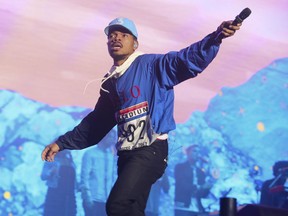 FILE - In this Oct. 7, 2017 file photo, Chance The Rapper performs on day two of the Austin City Limits Music Festival's first weekend, in Austin, Texas. Chance the Rapper says he has purchased the former news website Chicagoist, making the announcement in a new song. The Chicago native released four songs on his website late Wednesday, July 18, 2018, including "I Might Need Security," where he proclaims "I bought the Chicagoist." WNYC confirmed the acquisition in a statement.