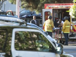 In this photo provided by Christian Monterrosa, a suspect is arrested after evading police and holding dozens of people hostage inside a Trader Joe's supermarket, Saturday, July 21, 2018, in Los Angeles.