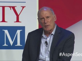 In this image from video provided by the Aspen Security Forum, National Intelligence Director Dan Coats speaks at the Forum in Aspen, Colo., on Thursday, July 19, 2018. Coats says his Thursday comments at the Aspen Security Forum in Colorado were not intended to be critical of the president's handling of the summit. (Aspen Security Forum via AP)