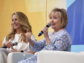Democratic presidential candidate and former Secretary of State Hillary Rodham Clinton, right, in conversation with Laurene Powell Jobs at OZY Fest in Central Park on Saturday, July 21, 2018, in New York.