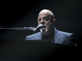 Musician Billy Joel performs during his 100th lifetime performance at Madison Square Garden on Wednesday, July 18, 2018, in New York.