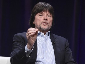 FILE - In this July 30, 2017 file photo, Ken Burns participates in the "The Vietnam War" panel during the PBS portion of the 2017 Summer TCA's in Beverly Hills, Calif. PBS says a 50th anniversary look at Woodstock and a Ken Burns series on the human genome will be among its upcoming documentaries. "The Gene: An Intimate History" will be a three-hour documentary series airing in 2020.