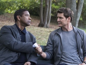 This image released by Columbia Pictures shows Denzel Washington, left, and Pedro Pascal in a scene from "Equalizer 2."