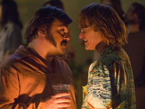 This image released by Amazon Studios shows Jack Black, left, and Joaquin Phoenix in a scene from "Don't Worry, He Won't Get Far On Foot."