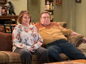 In this image released by ABC, Roseanne Barr, left, and John Goodman appear in a scene from the comedy series "Roseanne." "Roseanne," "Will & Grace," "Twin Peaks" and "American Idol" were among the reboots largely snubbed by the television academy on Thursday.