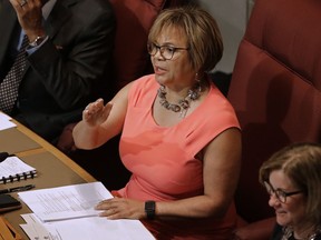 FILE - In this July 16, 2018, file photo, Charlotte Mayor Vi Lyles speaks to a packed chamber during a public forum before the Charlotte City Council votes whether to host the 2020 Republican National Convention in Charlotte, N.C. As Charlotte, North Carolina, celebrates being chosen Friday, July 20, to host the 2020 Republican National Convention, an undercurrent of concern about the potential for violence runs through the Democratic-leaning city. Lyles led the campaign to bring the convention to Charlotte and said in a newspaper column that it would be a chance for the city to show its inclusiveness.