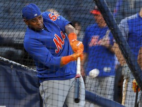 New York Mets' Yoenis Cespedes takes batting practice before a baseball game against the New York Yankees, Friday, July 20, 2018, in New York.