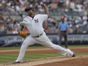 New York Yankees starting pitcher CC Sabathia delivers against the Atlanta Braves during the third inning of a baseball game, Wednesday, July 4, 2018, in New York.