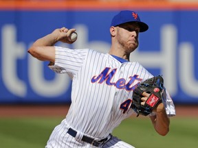 New York Mets' Zack Wheeler delivers a pitch during the first inning in the first game of a baseball doubleheader against the Philadelphia Phillies, Monday, July 9, 2018, in New York.