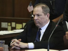 FILE - In this July 9, 2018, file photo, Harvey Weinstein attends his arraignment in court in New York. Weinstein's lawyers say Ashley Judd's allegations that he tried to hurt her career after she rejected him sexually are baseless, and they have asked a judge to dismiss her lawsuit against him. The court documents filed Wednesday, July 18, discuss Judd's comment that she would only let Weinstein touch her after she won an Academy Award in one of his films.
