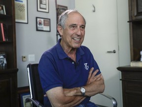 FILE - In this May 3, 2018, file photo, attorney Lanny Davis speaks during an interview with The Associated Press in his K Street office in Washington. President Donald Trump's longtime personal lawyer and fixer Michael Cohen has Davis, added a close friend of Bill and Hillary Clinton, to his legal team.