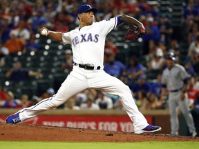 FILE - In this Monday, June 25, 2018, file photo, Texas Rangers relief pitcher Keone Kela (50) throws against the San Diego Padres during the ninth inning of a baseball game in Arlington, Texas. The Pittsburgh Pirates have acquired hard-throwing closer Keone Kela from the Texas Rangers for two players to be named, in a deal announced late Monday, July 30, 2018.