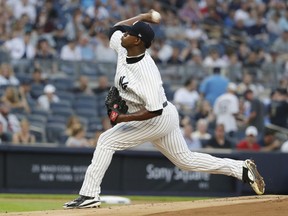 New York Yankees' Luis Severino delivers a pitch during the first inning of a baseball game against the Boston Red Sox, Sunday, July 1, 2018, in New York.