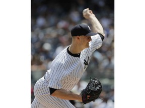 New York Yankees' J.A. Happ delivers a pitch during the first inning of a baseball game against the Kansas City Royals, Sunday, July 29, 2018, in New York.