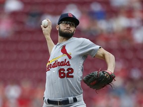 St. Louis Cardinals starting pitcher Daniel Poncedeleon (62) throws against the Cincinnati Reds during the first inning of a baseball game, Monday, July 23, 2018, in Cincinnati.