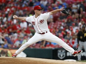 Cincinnati Reds starting pitcher Anthony DeSclafani throws during the first inning of a baseball game against the Pittsburgh Pirates, Saturday, July 21, 2018, in Cincinnati.