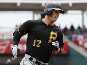 Pittsburgh Pirates' Corey Dickerson runs the bases after hitting a two-run home run off Cincinnati Reds starting pitcher Matt Harvey in the second inning of a baseball game, Sunday, July 22, 2018, in Cincinnati.
