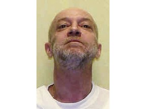 FILE – This undated file photo provided by the Ohio Department of Rehabilitation and Correction shows Raymond Tibbetts, who was sentenced to death after he was convicted of fatally stabbing Fred Hicks in 1997 in Cincinnati. Ohio Gov. John Kasich spared Tibbetts on Friday, July 20, 2018, commuting the condemned killer's death sentence to life without the possibility of parole. In 2017, juror Ross Geiger came forward to say he felt jurors weren't given enough information about the convicted killer's tough childhood.